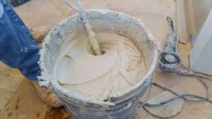 Mixing tile adhesive
