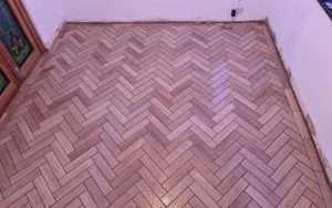 Grout on the same day as tiling